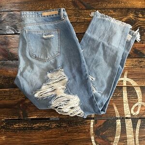 Cello heavy distressed light wash relaxed fit jeans. Size 9